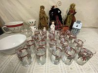 Entire lot showing glassware front, serveware and decor rear