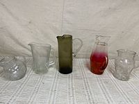 Group shot of all five glass vessels lined up