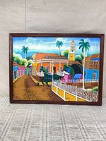 Full view of framed acrylic painting showing town street scene