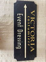 Full sign showing text and arrow orientation