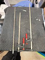 Full view of three Bessey 36 in bar clamps