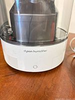 Base of Dyson AM10 showing logo and control