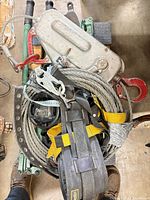 Pile view showing harness, winch, wire rope and hardware