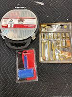 Overall lot showing all three packaged items