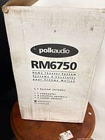 Outer box showing brand, model and system contents