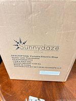 Sealed Sunnydaze carton showing product description and branding