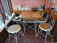 Full set: table with four chairs positioned around it