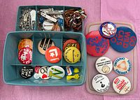 Overall view of organizer box with buttons and accessories, plus extra large buttons to the side