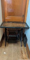 Full view of Singer treadle base with cubby top