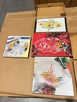 group of boxed glass serveware items