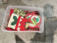 Top view of tote showing quilted potholders, placemats and Solo paper plates