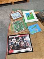 Group view of all wall art items on blanket