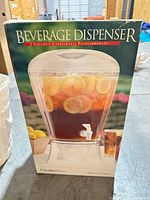 Boxed CreativeWare beverage dispenser front view