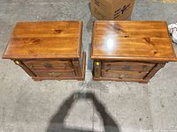 Top view of both nightstands showing veneer finish and overall condition
