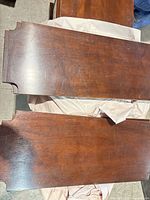 Top surface showing mahogany veneer and edge profile