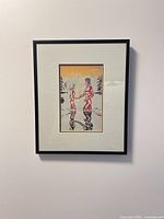 Front view of framed print on wall