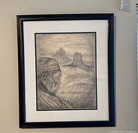 Full view of framed drawing on wall