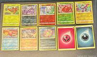 Group shot of all ten Pokémon TCG cards laid out in two rows