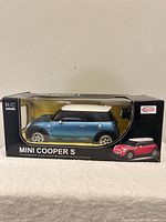 Front view of boxed Rastar Mini Cooper S RC car