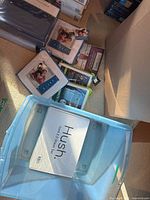 Overview of all bedding items: two Tommy Hilfiger sheet sets, four pillow protector packs, Hush sheet set box