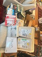 Full layout of all packaged bedding, back brace, clock