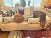 Front view of all pillows arranged on sofa