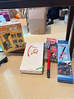 Boxed items: MaxxDry dryer box, white box, red lock blister pack, blue lock box