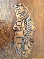 Front view of carved fish wall art