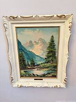 Full view of framed painting showing artwork and plaque