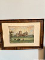 Front view of framed watercolor artwork showing image, mat and frame