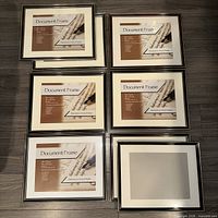 Front view of eight 14×11 document frames, labels visible