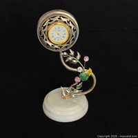 Full view of Citizen table clock on marble base