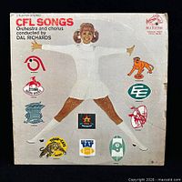 Front of jacket with title, cheerleader image, CFL logos