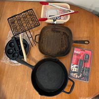 Overview of all cookware and accessories on table