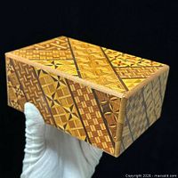 top and two sides showing full Yosegi veneer pattern of puzzle box