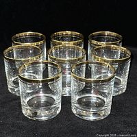 Group shot of all eight gold-rimmed Pasabahce glasses