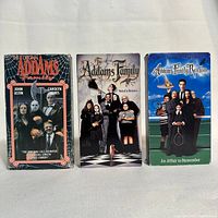 Front covers of three Addams Family VHS tapes