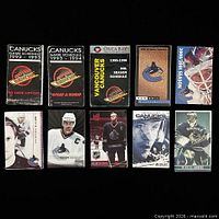 Front covers of six schedule booklets showing various seasons and cover designs