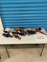 Full table view of assorted hair styling tools