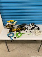 Group shot of all tools and cords on table