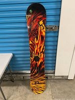Full length front view of Lib Tech snowboard
