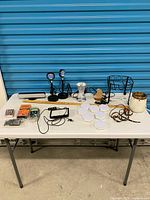 Full lot overview on table showing all lighting items