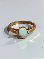 Full view of opal and diamond ring