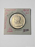 Obverse view of 1947 Colombia 50 Centavos coin in holder