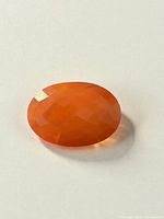 Top view of the 41.5-carat orange faceted gemstone