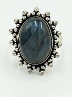 Front view showing labradorite cabochon and beaded silver border