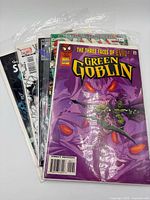 Stack of eight bagged Marvel comics, Green Goblin issue visible at front