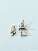 Front view of both charms