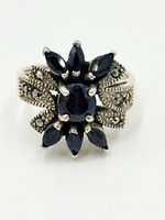 Top view showing floral sapphire cluster and marcasite-set shoulders