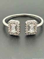 close-up of ring showing stones and design